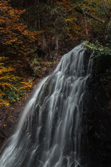 Fototapeta na wymiar Amazing long exposure of a waterfall in Quebec, Canada