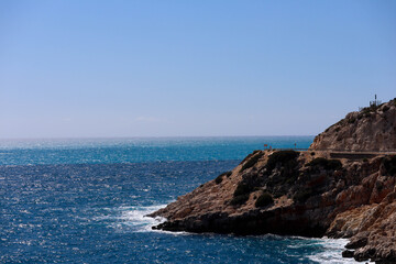 Fototapeta na wymiar cliffs at the coast of azure mediterranean sea