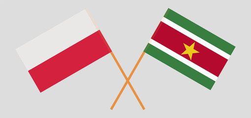 Crossed flags of Poland and Suriname. Official colors. Correct proportion