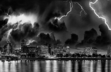 Fototapeta na wymiar Storm approaching Portland, Oregon. City skyline with lightnings
