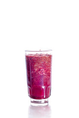 glass of grape juice on a white background
