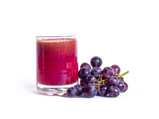 Red grape juice in glass and grape fruit isolated on white background
