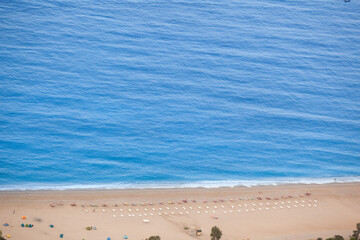 Top view of sunny sea beach in Turkey Oludeniz