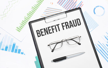 benefit fraud sign. Conceptual background with chart ,papers, pen and glasses