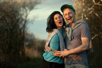 Fototapeta premium couple outdoors. Couple in love. Happy day. Smiling. Summer time. 