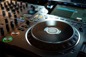 Player and mixing console closeup. DJ equipment