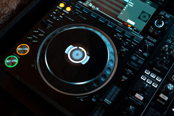 Player and mixing console closeup. DJ equipment