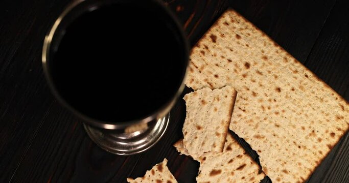 holy communion chalice with wine and bread. Super slow motion