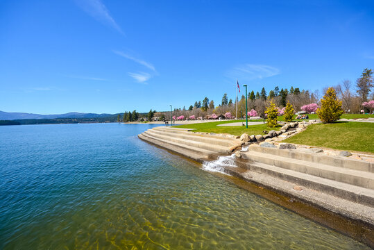 The city beach, steps and lake at Independence Point in the downtown area of Coeur d'Alene, Idaho USA at spring.