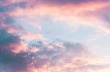 Naklejka na ściany i meble Beautiful sunset sky with pink and purple clouds