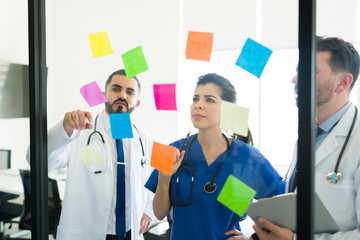 Medical specialists planning their hospital rounds