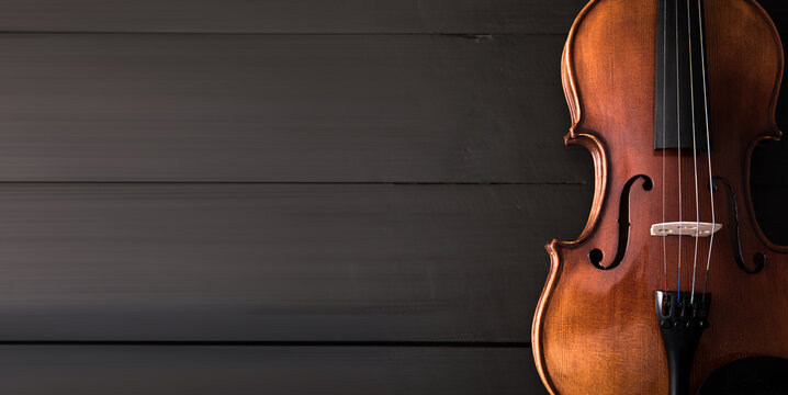 beautiful violin on wooden table