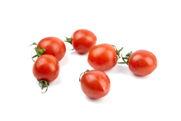 Tomatoes isolated on white. Heap of fresh red tomatoes