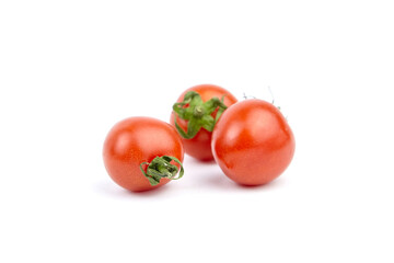 Tomatoes isolated on white. Heap of fresh red tomatoes