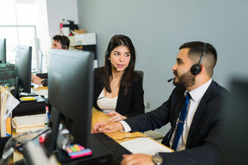 Busy executives discussing a work problem