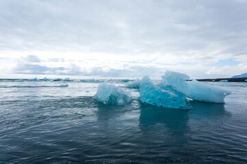 Fototapeta na wymiar Icebergs on water, Jokulsarlon glacial lake, Iceland