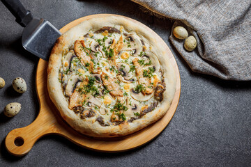 Pizza with bacon, tomatoes, cheese and olives. Italian Cuisine.