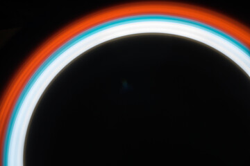 Long exposure photo two light sources red and blue in motion