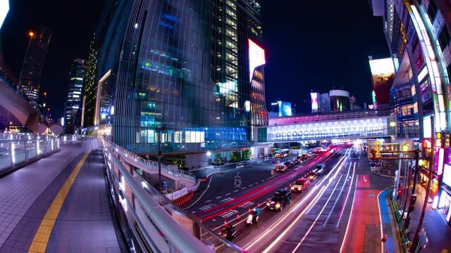 A night timelapse of the neon street at Meiji avenue in Shibuya fish eye shot. 