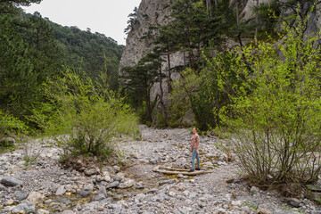 camping, travel, tourism, hike and people concept - happy girl