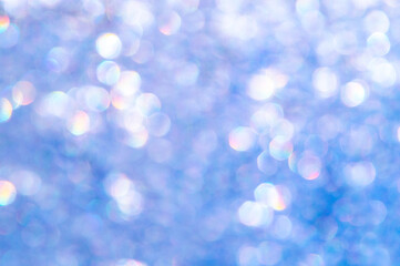 Obraz premium bright glitter background: bokeh effect from many colored lights on frozen glass, toning