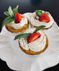 Strawberry shortcake cupcakes with fresh mint