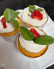 Strawberry shortcake cupcakes with fresh mint