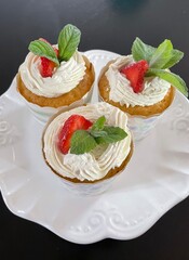 cupcakes with strawberry and cream