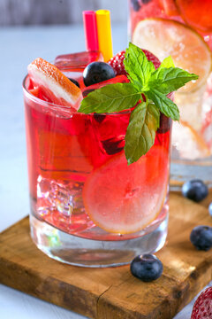 cocktail with mint, strawberry and orange