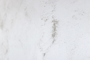 Defocused gray concrete wall painted in white and gray, loft style.