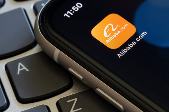 Portland, OR, USA - Apr 21, 2021: Alibaba.com mobile app icon is seen on an iPhone. China fined Alibaba Group, the e-commerce giant, record 18 billion yuan for anti-monopoly violations on April 10.