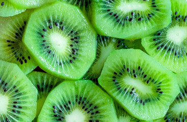 Sliced kiwi as background