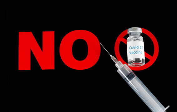 Covid 19 Vaccine Bottle With Needle And Syringe On A NO Sign