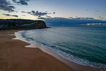 Aerial sunrise seascape with clouds