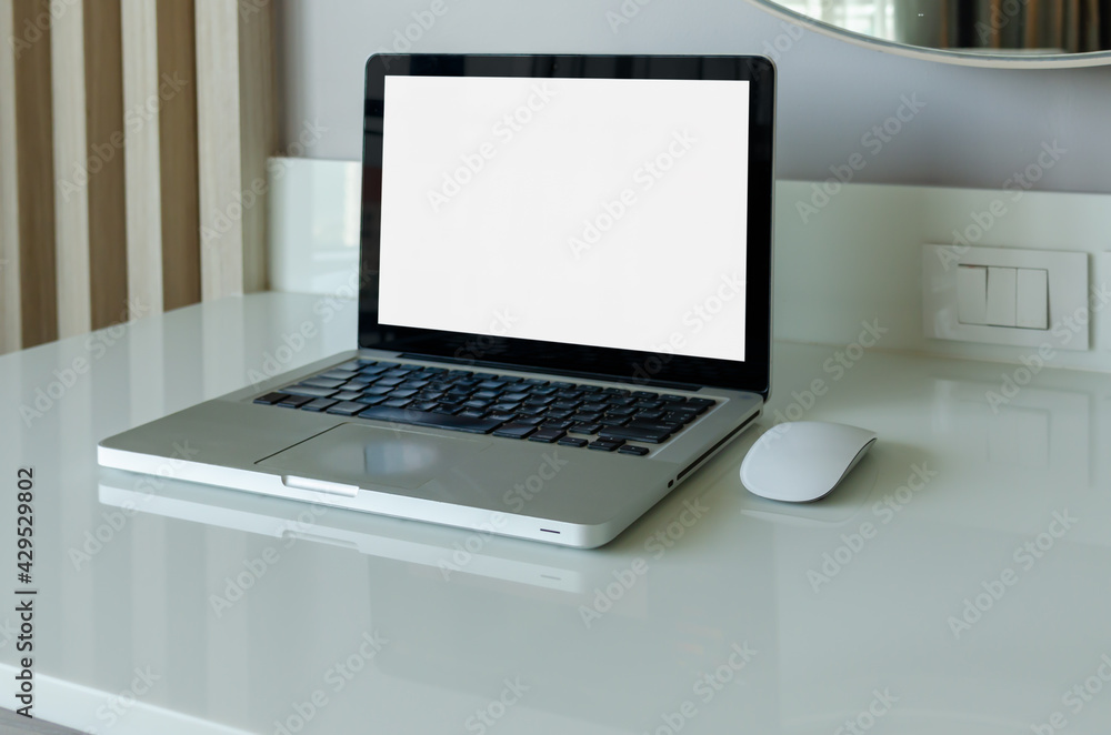 Poster computer laptop mock up and mouse white blank screen on table.