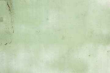 Fototapeta na wymiar weathered green oil wall