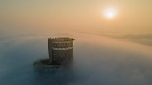 Skyscrapers rising above the clouds Aerial, Tel Aviv, Israel
Drone View over Buildings on fogy day, September,20,2021, Tel aviv, Israel
