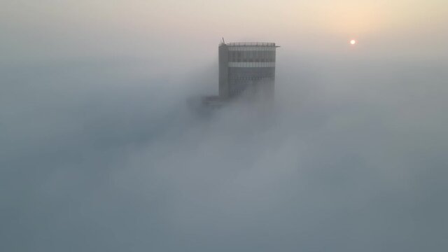 Skyscrapers rising above the clouds Aerial, Tel Aviv, Israel
Drone View over Buildings on fogy day, September,20,2021, Tel aviv, Israel
