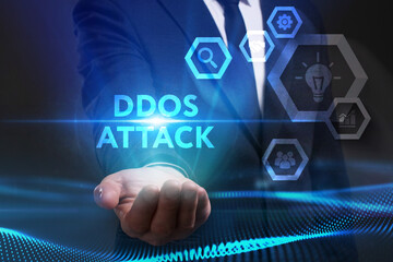 Business, Technology, Internet and network concept. Young businessman working on a virtual screen of the future and sees the inscription: Ddos attack