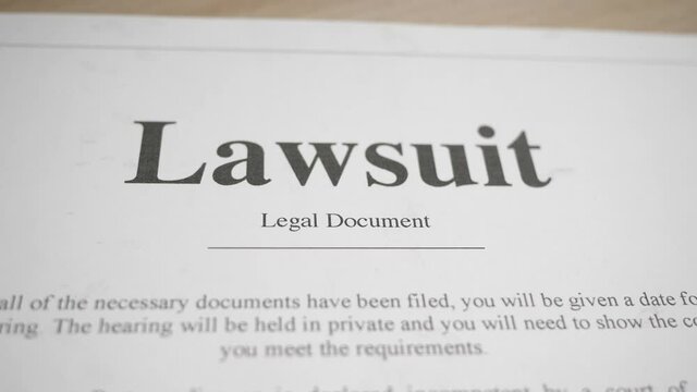 Lawsuit Legal Document Closeup Panning