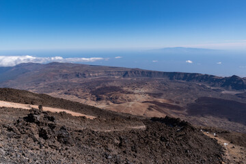 Fototapeta na wymiar View from Teide то Las Canadas Caldera volcano with solidified lava and Montana Blanca mount. Teide national Park, Tenerife, Canary Islands, Spain.