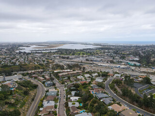 Aerial view of Balboa neighborhood with houses and residential condos during clouded day in San Diego, California, USA.