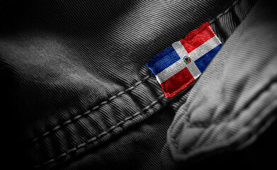 Tag on dark clothing in the form of the flag of the Dominicana