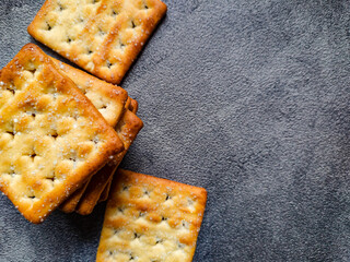 Close up Stack of Sweet Crunchy Crackers isolated on abstract background. Flat Lay.