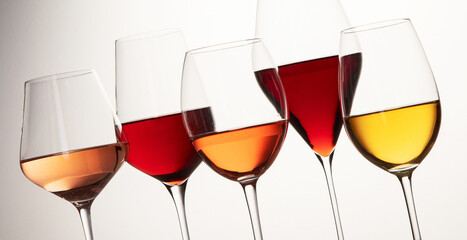 Red, rose and white wine in glasses
