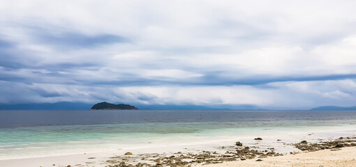 Fototapeta na wymiar Tropical Sea and Beach. Island in Southern of Thailand. Sea Scape.