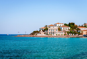Neoclassic houses by the sea in Spetses island, Saronic gulf, Greece.