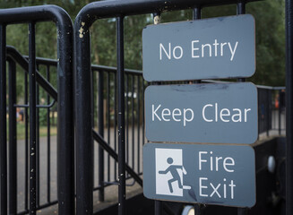 fire exit sign on a blocked door