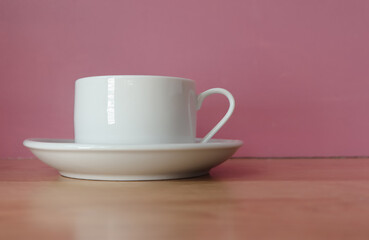 coffee cup on pink background.