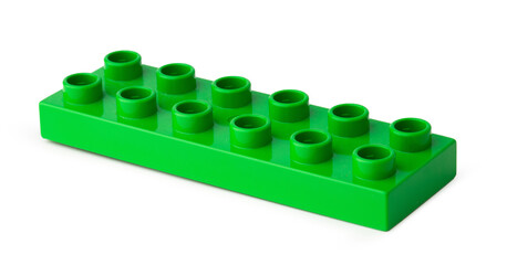 Green plastic building block isolated on white